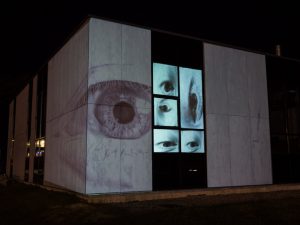 Photo of projection mapping on the IMRC building