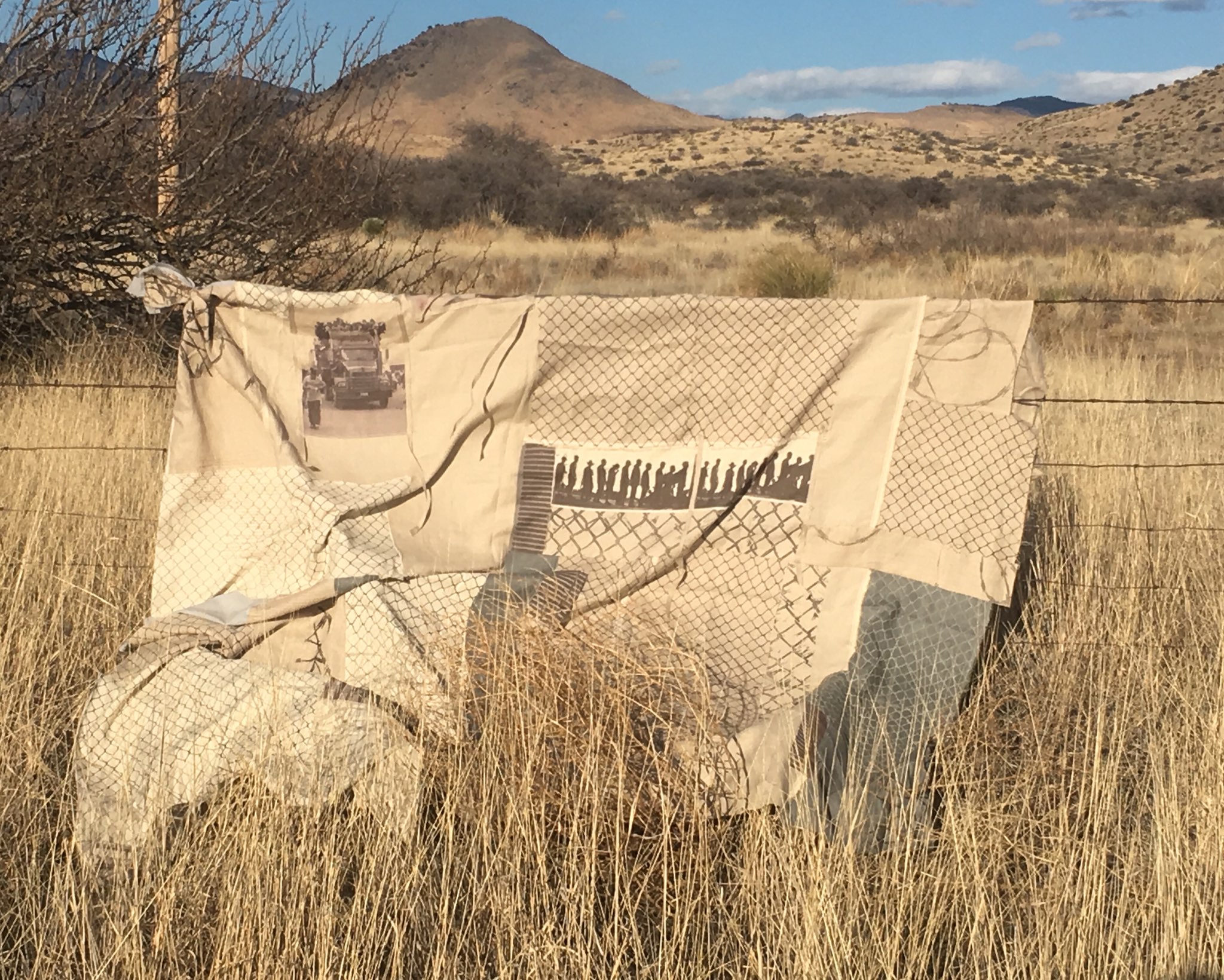 Image os textle piece Mourning Cloth tied to barbed wire fense ins Texas