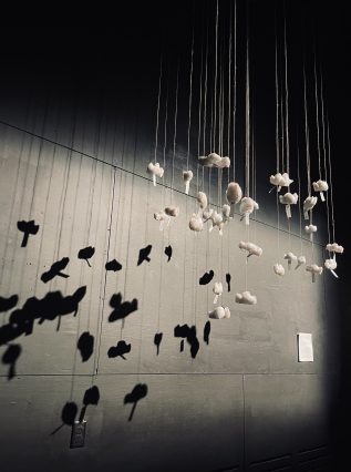 Emily Whittemore's participatory installation of hanging clouds all on their own individual strings