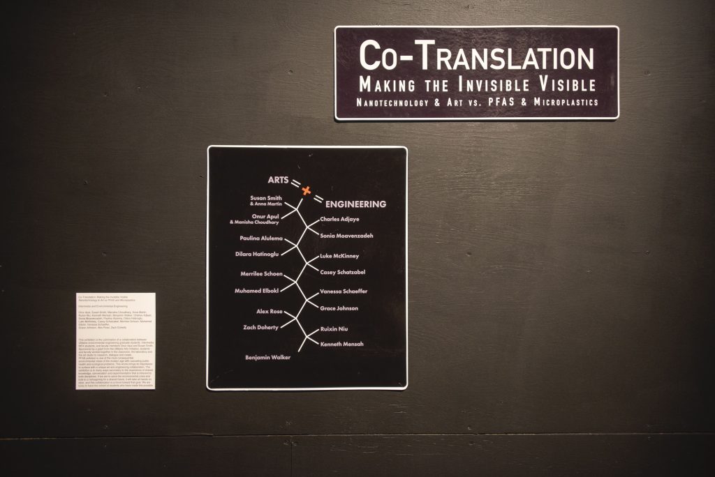wall text which reads the show title, names of collaborators, and a brief statement that hung on the exhibition space wall